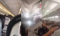Yolcu uçağında korku dolu anlar! Havada motor patladı, kabin tavanı çöktü
