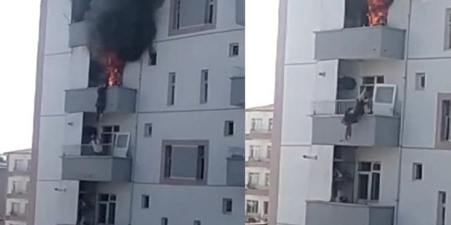 Yangın sırasında balkonda mahsur kalan kadın camdan atladı! Alt komşusu atlayan kadını havada tuttu.